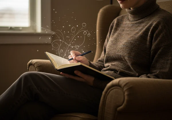 Person journaling for emotional reflection and clarity